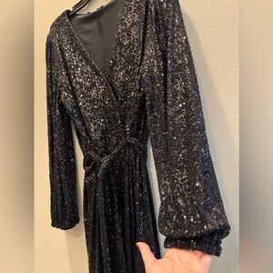 Black belted sequin dress